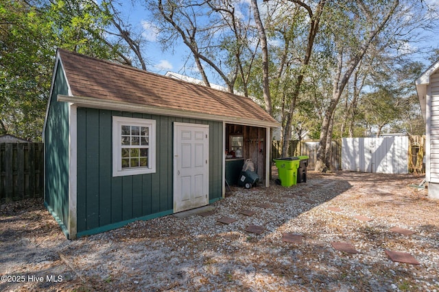 110 SE 7th St, Oak Island, NC 28465 - view of shed with fence
