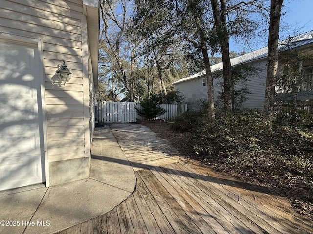 110 SE 7th St, Oak Island, NC 28465 - wooden deck with fence
