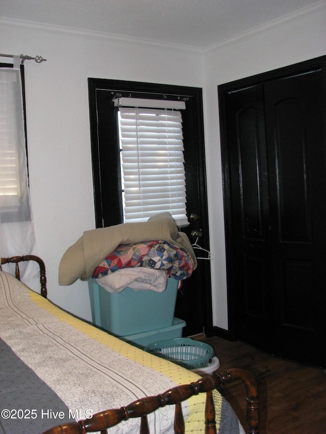 bedroom featuring crown molding