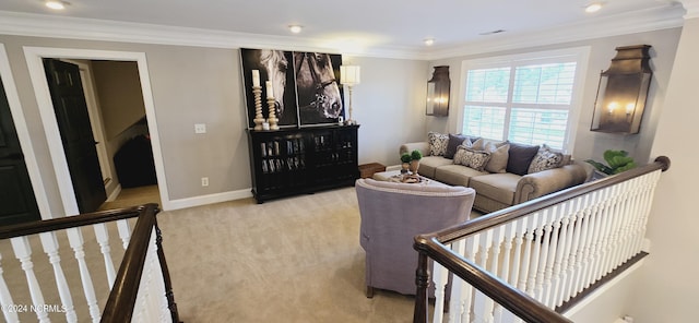 living room with visible vents, ornamental molding, light colored carpet, and baseboards