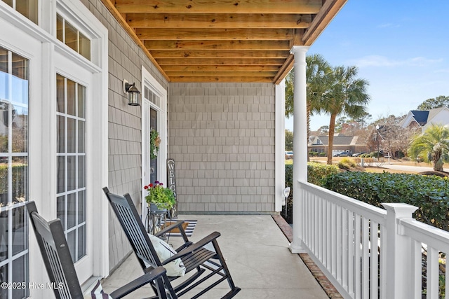 balcony featuring a porch