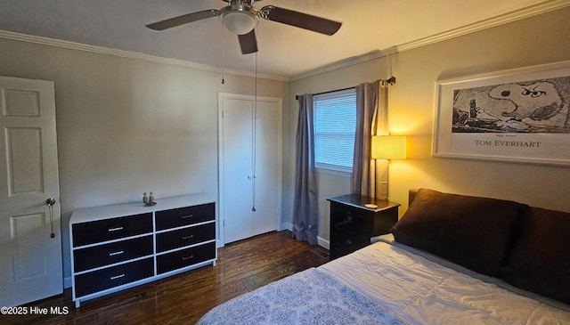 bedroom with a ceiling fan, wood finished floors, a closet, and ornamental molding