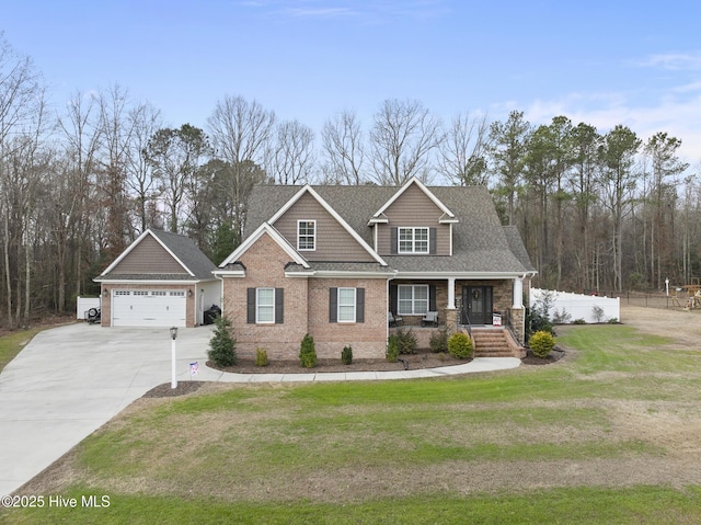 craftsman-style home featuring concrete driveway, roof with shingles, covered porch, fence, and a front lawn