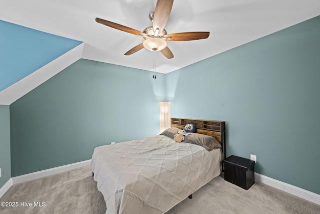 bedroom featuring lofted ceiling, carpet flooring, ceiling fan, and baseboards