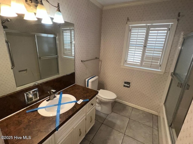 bathroom with crown molding, a shower stall, vanity, tile patterned flooring, and wallpapered walls