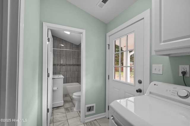 laundry room featuring visible vents, marble finish floor, cabinet space, baseboards, and washer / dryer