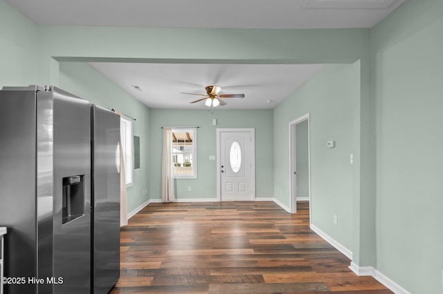 foyer featuring baseboards, dark wood-style floors, and a ceiling fan