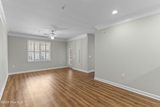 unfurnished room with recessed lighting, ornamental molding, a ceiling fan, wood finished floors, and baseboards