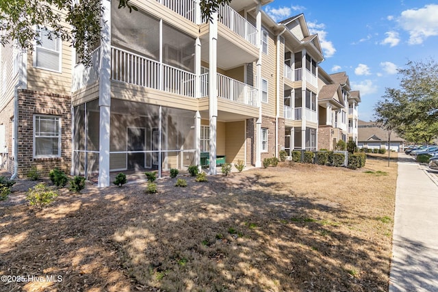 view of building exterior with a residential view