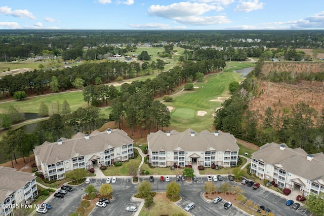 birds eye view of property featuring view of golf course