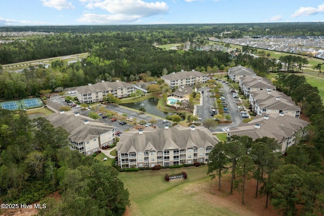 bird's eye view with a residential view and a water view