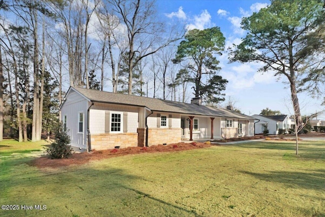 ranch-style house with crawl space, stone siding, a chimney, and a front yard