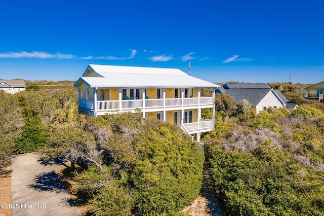 back of property with metal roof