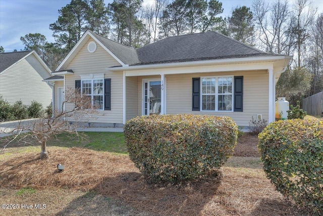 view of front of house featuring roof with shingles