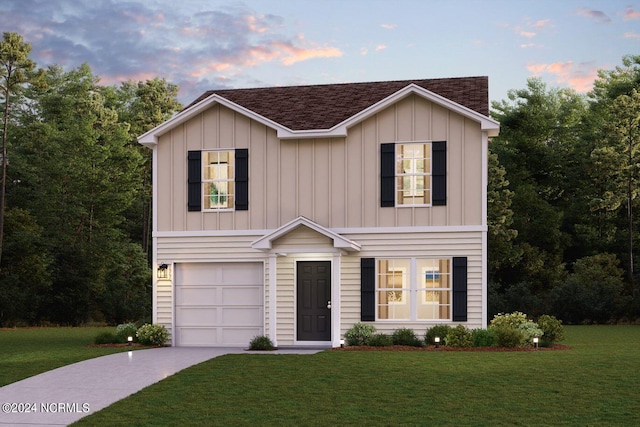 traditional home with a shingled roof, concrete driveway, an attached garage, a front lawn, and board and batten siding