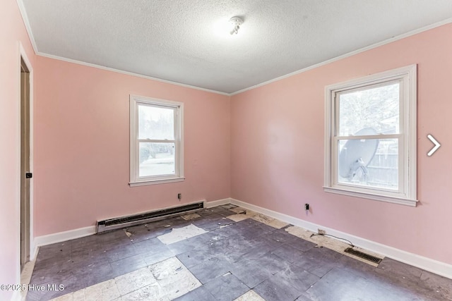 315 Glenfield Rd, Snow Hill, NC 28580 - empty room featuring baseboards, visible vents, crown molding, and baseboard heating