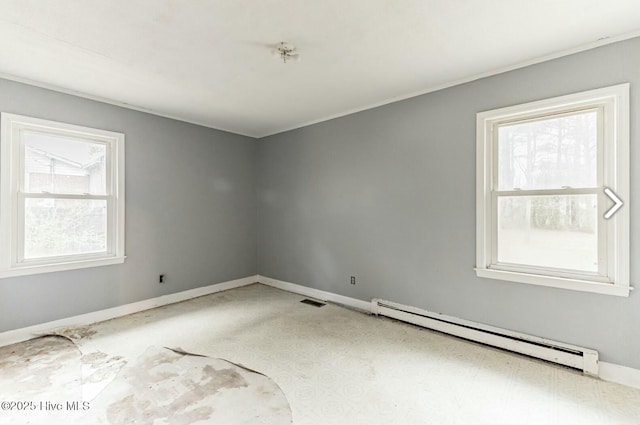 315 Glenfield Rd, Snow Hill, NC 28580 - spare room featuring baseboard heating, visible vents, and baseboards