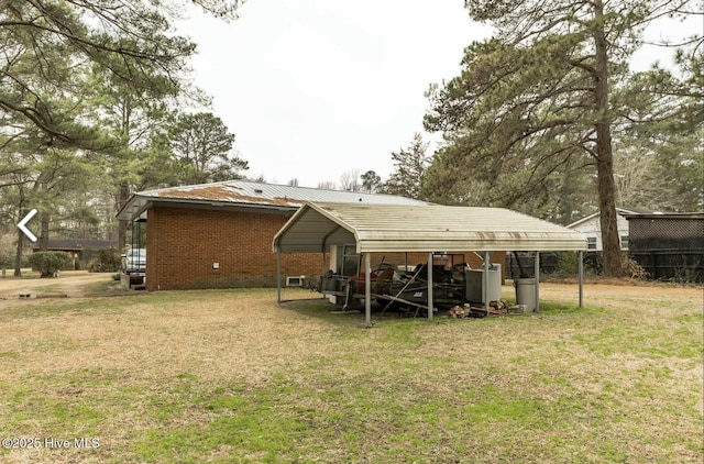 315 Glenfield Rd, Snow Hill, NC 28580 - back of property with metal roof, brick siding, and a lawn