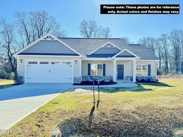 craftsman-style home with an attached garage, stone siding, driveway, and board and batten siding