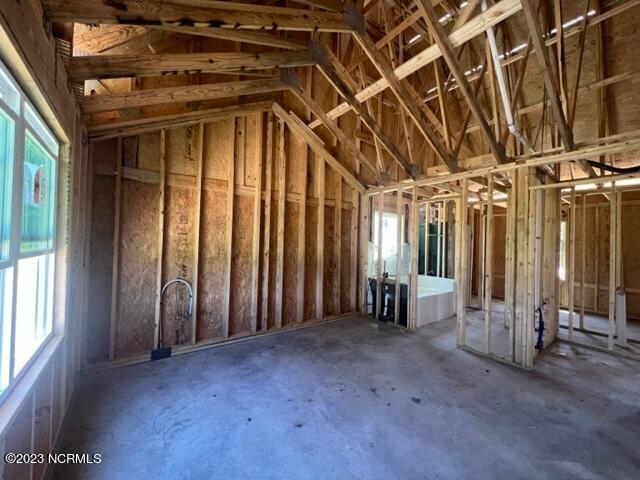 misc room featuring lofted ceiling