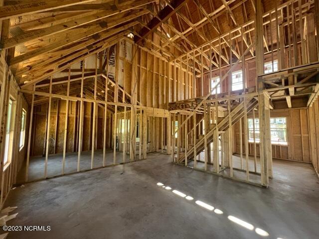 misc room with vaulted ceiling