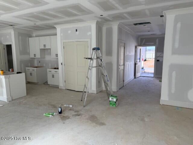 interior space featuring white cabinets