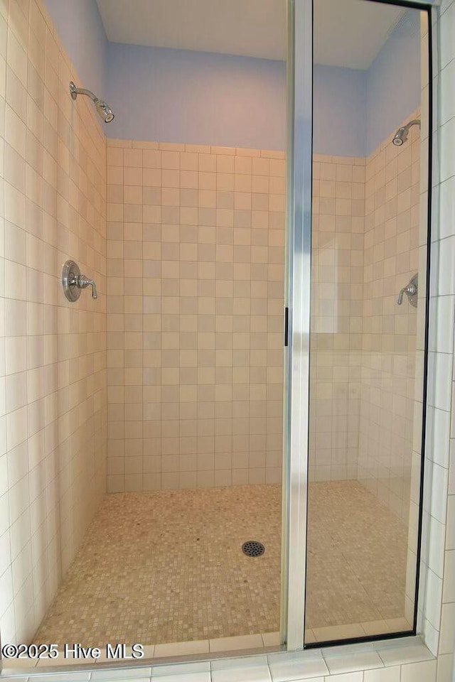 bathroom featuring a stall shower