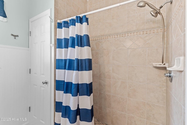 full bathroom with a tile shower