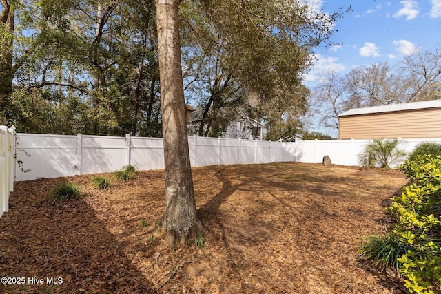 view of yard featuring a fenced backyard