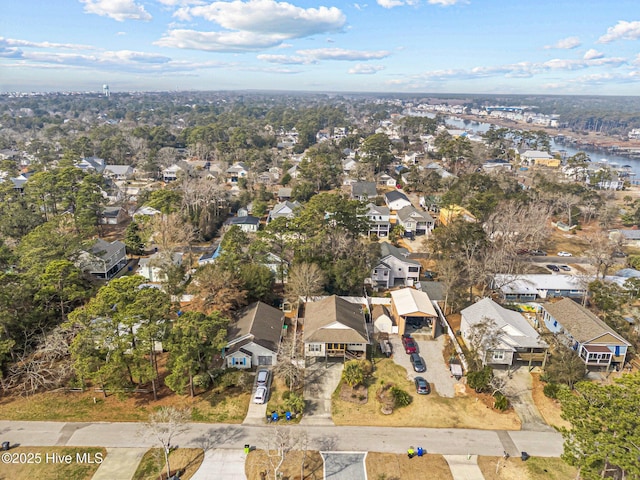 birds eye view of property featuring a water view and a residential view