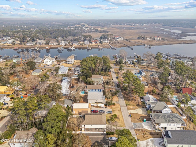 aerial view featuring a residential view and a water view