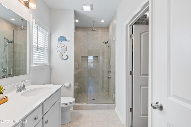 full bathroom featuring tile patterned floors, toilet, a stall shower, recessed lighting, and vanity