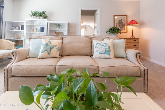 5982 Gray Squirrel Path, Southport, NC 28461 - living area featuring carpet and baseboards