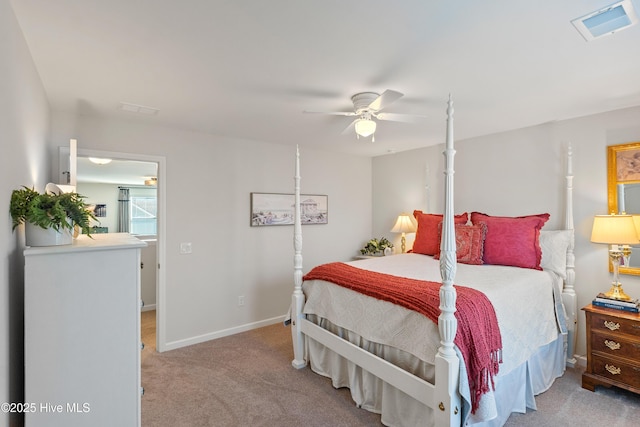 5982 Gray Squirrel Path, Southport, NC 28461 - carpeted bedroom with visible vents, baseboards, and a ceiling fan
