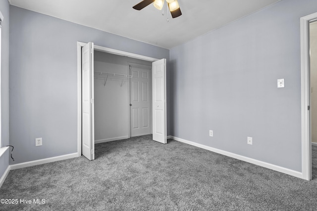 unfurnished bedroom featuring a closet, carpet flooring, ceiling fan, and baseboards