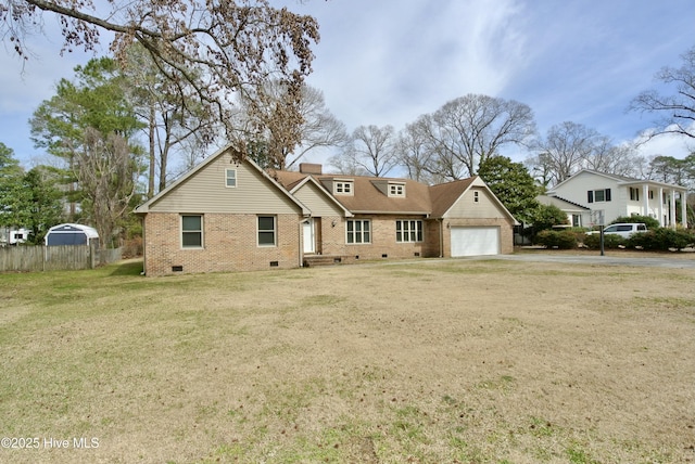 view of front facade featuring an attached garage, brick siding, crawl space, a front lawn, and a chimney