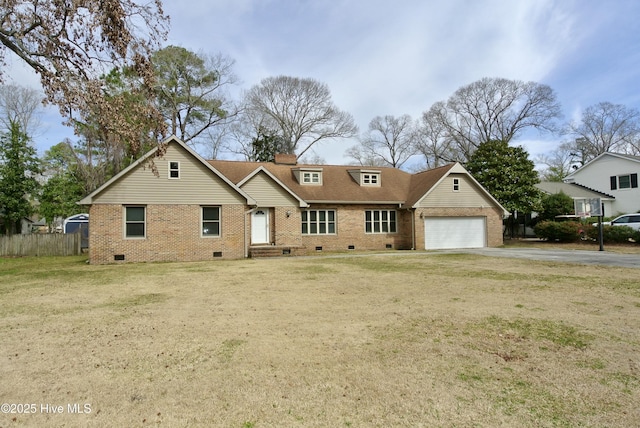 view of front of property featuring driveway, brick siding, crawl space, and a front yard