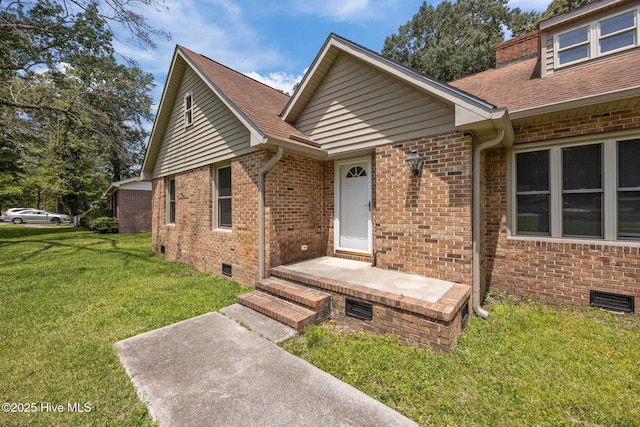 3610 Wedgewood Dr, Trent Woods, NC 28562 - view of front of home with a front lawn, crawl space, brick siding, and a shingled roof