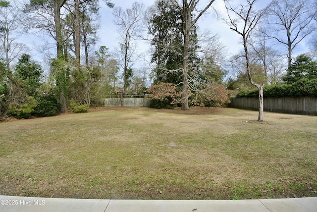 view of yard with fence