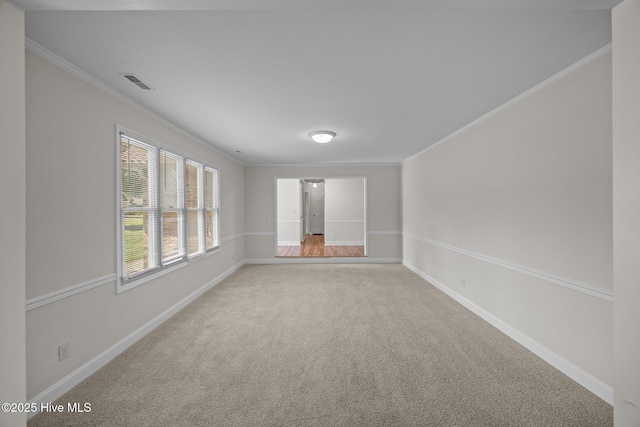 3610 Wedgewood Dr, Trent Woods, NC 28562 - empty room featuring light colored carpet, crown molding, and baseboards