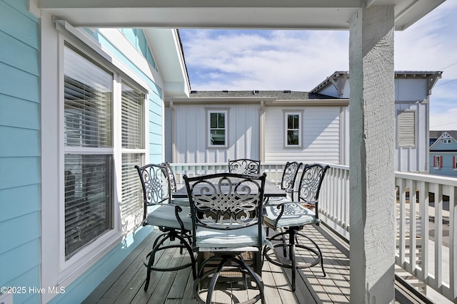 balcony with outdoor dining area