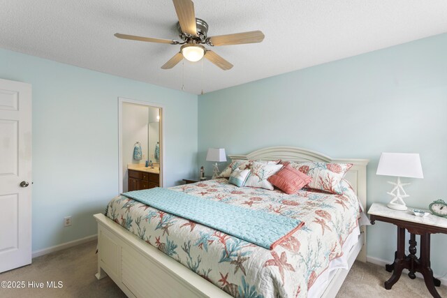 bedroom featuring baseboards, light colored carpet, and ceiling fan