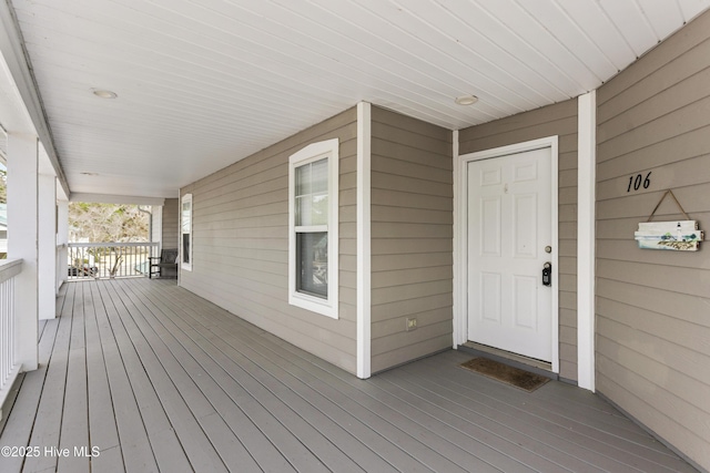 deck featuring covered porch