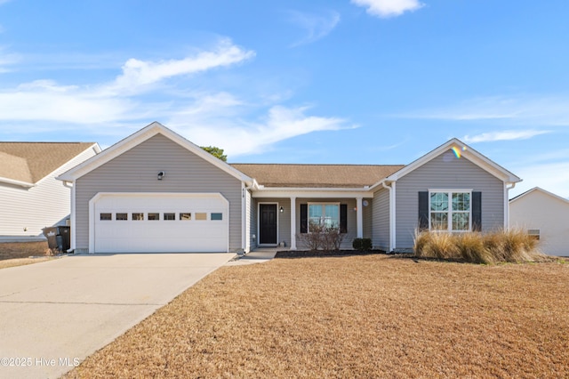 ranch-style home featuring a garage, concrete driveway, and a front yard