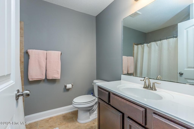 full bathroom featuring tile patterned flooring, vanity, toilet, baseboards, and curtained shower