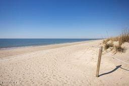 property view of water featuring a view of the beach