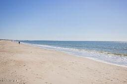 property view of water featuring a beach view