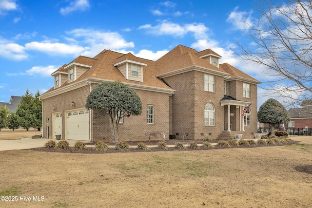 view of front of home with a shingled roof, crawl space, brick siding, and driveway