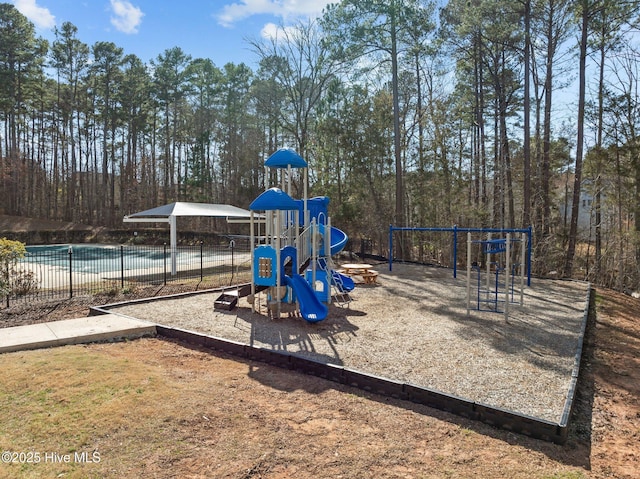 community jungle gym with fence