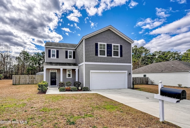 view of front of house featuring driveway, a garage, a porch, fence, and a front lawn